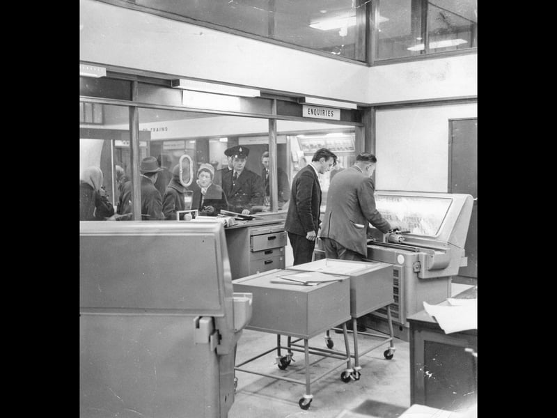 Railway clerks operate mechanical ticket-issuing machinery inside the modernised ticket office at Stafford station on December 28, 1962. Through the glass partition, passengers line up in the main booking hall to make enquiries and secure their fares during the busy getaway period between Christmas and the New Year. Following a major rebuilding project in the early 1960s as part of the West Coast Main Line electrification, the station offered travellers a sleek, contemporary space complete with state-of-the-art booking technology. Do you remember queueing up for paper tickets at Stafford station back in the 1960s?