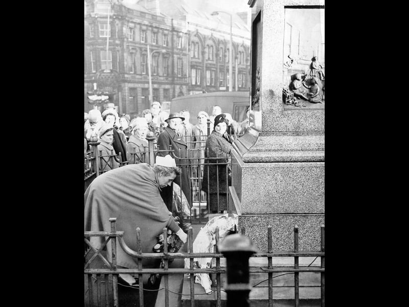 Miss A M Libbey, hospital matron, leans over the railings to lay a floral wreath at the base of the Sister Dora statue on January 16, 1962. A quiet crowd of onlookers bundled up against the winter cold gathered at The Bridge in Walsall to mark the birthday anniversary of the town’s legendary nurse. Known as Walsall’s own ‘Lady of the Lamp,’ Dorothy Wyndlow Pattison (Sister Dora) won the hearts of the Black Country for her selfless devotion to caring for injured industrial workers and smallpox victims during the 19th century. Do you remember seeing the annual wreath-laying ceremony at the Sister Dora statue back in the 1960s?