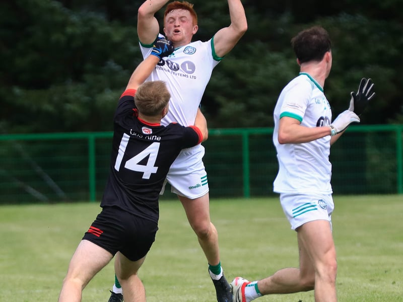 Action from the McFeely Group Derry IFC Group B game.
