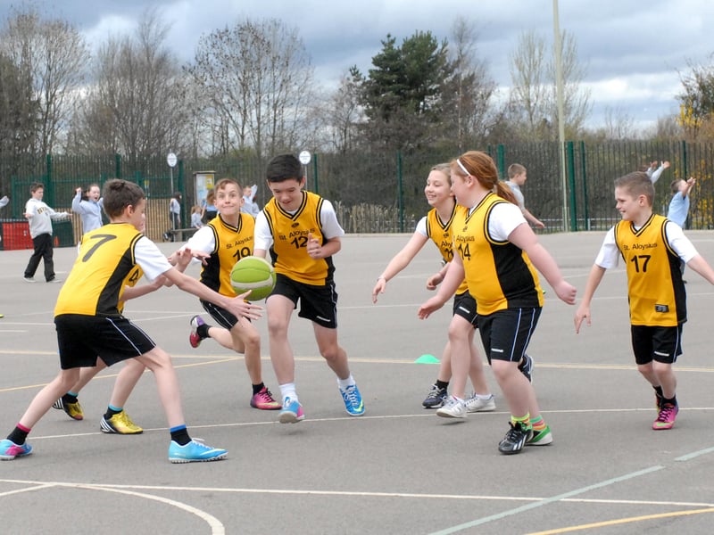 The school's basketball team was pictured preparing after they reached the final stages of the national competition 13 years ago.