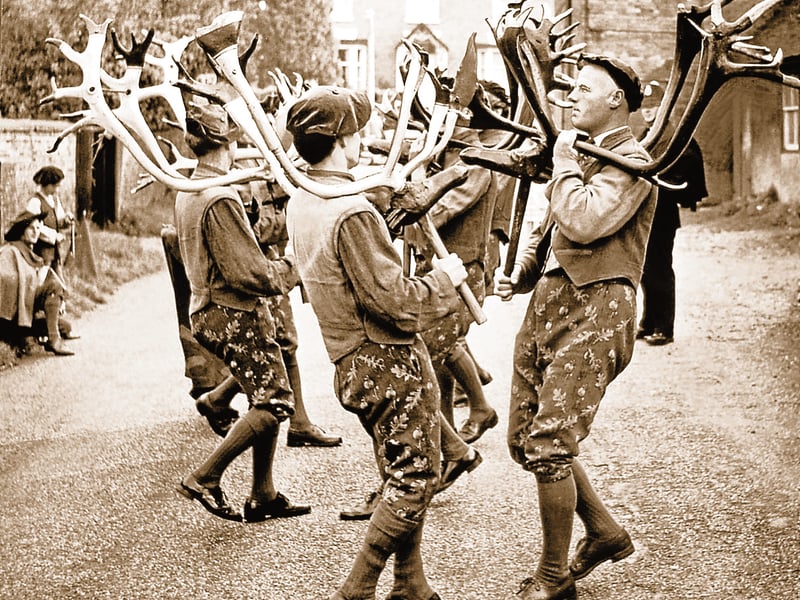 Dressed in traditional breeches and caps, members of the Abbots Bromley Horn Dance take to the streets early in the morning on September 10, 1962. Carrying heavy reindeer antlers mounted on wooden heads, the performers stepped out to recreate one of Britain's oldest surviving folk customs, believed to trace its origins back to pre-Norman times. The day-long procession sees the dancers cover miles around the village and countryside, preserving an extraordinary piece of local heritage that continues to draw spectators from across the region. Have you ever witnessed the historic Horn Dance in Abbots Bromley or taken part in local traditional customs?