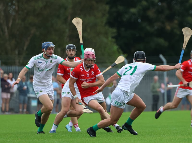 Monaleen's Luke Murphy under pressure from Killian Gavin and Jamie Behan of Ballybrown