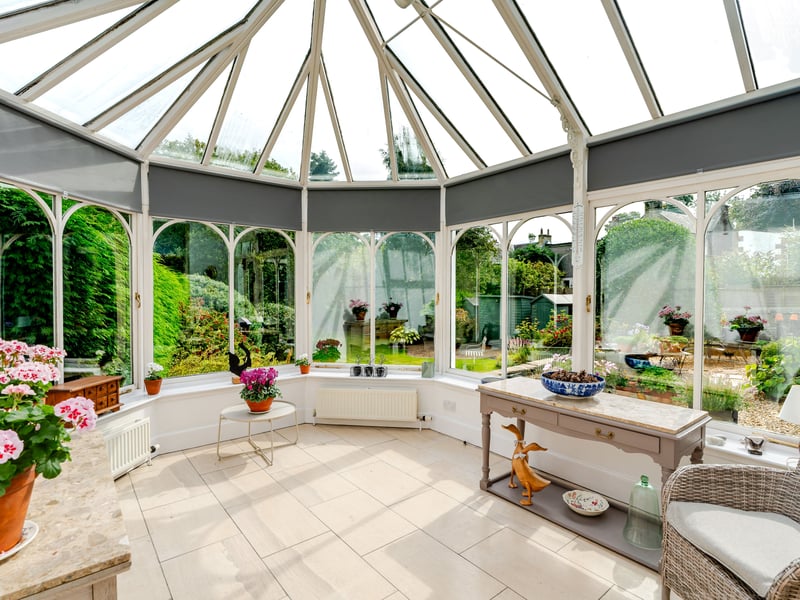 For cosy evenings, the sitting room is centred around a working gas fire and surround. This separate conservatory offers another pleasant reception space, enjoying views and direct access to the exceptional rear garden. This provides a lovely connection between the house and garden, with the extensive grounds offering numerous areas in which to sit, dine and enjoy the outdoors.