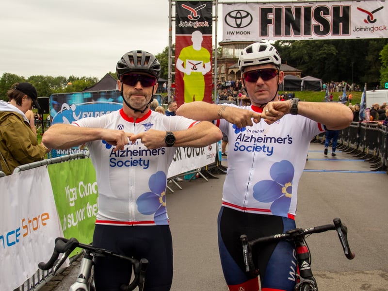 Alzheimer's Society cyclists doing the Joining Jack salute. Picture: AM Standish