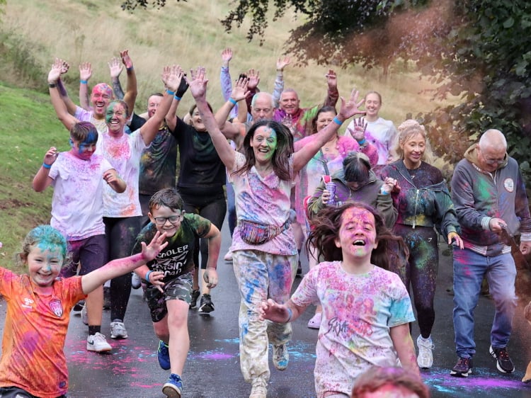 There were lots of smiles from participants taking part in the colour run.