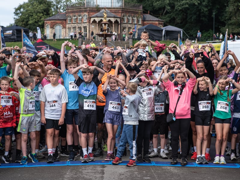 Children do the Joining Jack salute. Pic: Gavin Keith Hough