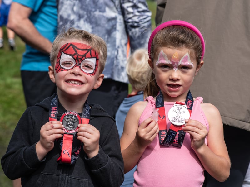 Face painting and medals for this pair. Pic: Gavin Keith Hough