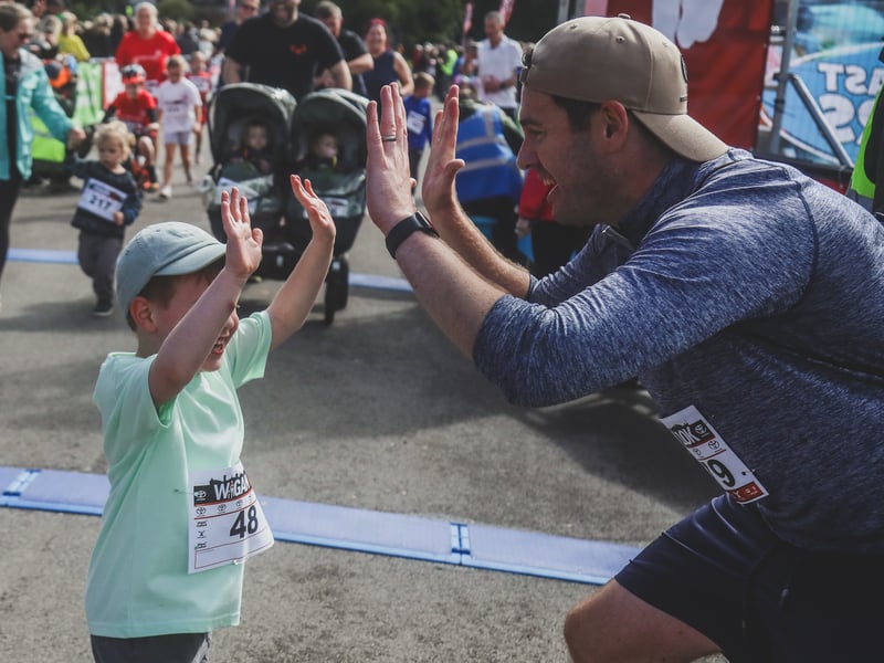 Celebrations at the finish line. Pic: Michelle Charnock Photographer