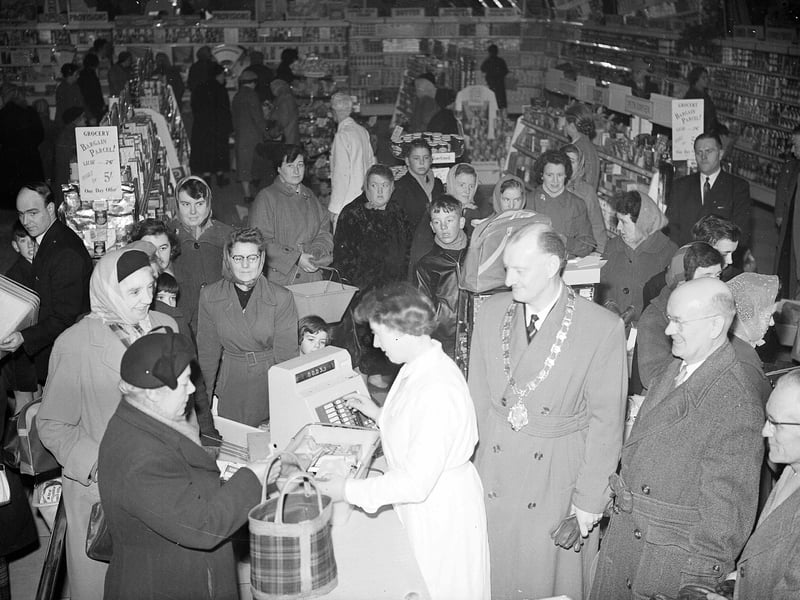 The first customer is served at St Cuthberts Co-operative Association's new department store in Bonnyrigg in January 1959.