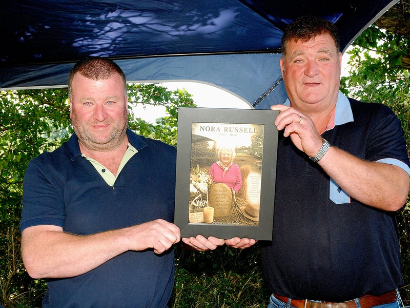 The Russell brothers, Sean and Seamus, with a photo of their Mother Nora (RIP). Photo: PJ Wright