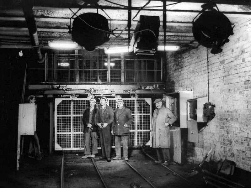 Littleton Colliery, Huntington, was the first pit in Britain to have a closed circuit TV camera and screen underground. The installation was at the bottom of one of the shafts to help the onsetter, the man in charge of cages at the pit bottom, to load them with mine cars. As seen in this February 1964 picture, the camera was fixed at the onsetter's blind spot, and illumination was provided by two 1,000 watt floodlights.