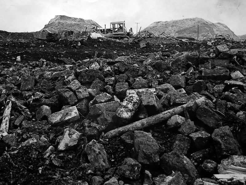 Flashback to August 1968. The original caption was: "After surviving its closure by 19 years, the Conduit Colliery at Norton Canes, Cannock, is finally being ground into history. Solid remains of the buildings are being attacked by bulldozer in a £14,000 clearance operation. About 42 acres will be levelled ready to be used by Cannock Urban Council for industry, housing, and open space. Conduit closed in 1949 after a century of chequered existence including work layoffs through flooding."