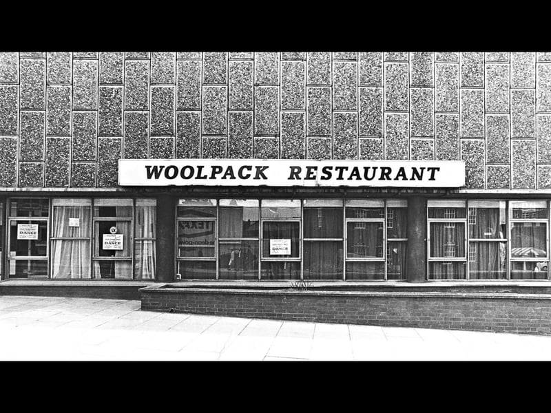 The distinctive, pebble-dash exterior of the Woolpack Restaurant on Salop Street is pictured in June 1969. A popular haunt for local diners and night-outs in Wolverhampton town centre, posters displayed in the large front windows advertise upcoming dance events alongside its regular dining service. The modern mid-century architecture was a familiar sight for shoppers and revellers navigating the town's changing streetscape during the late 1960s. Did you ever enjoy a meal or a night out dancing at the Woolpack Restaurant on Salop Street?