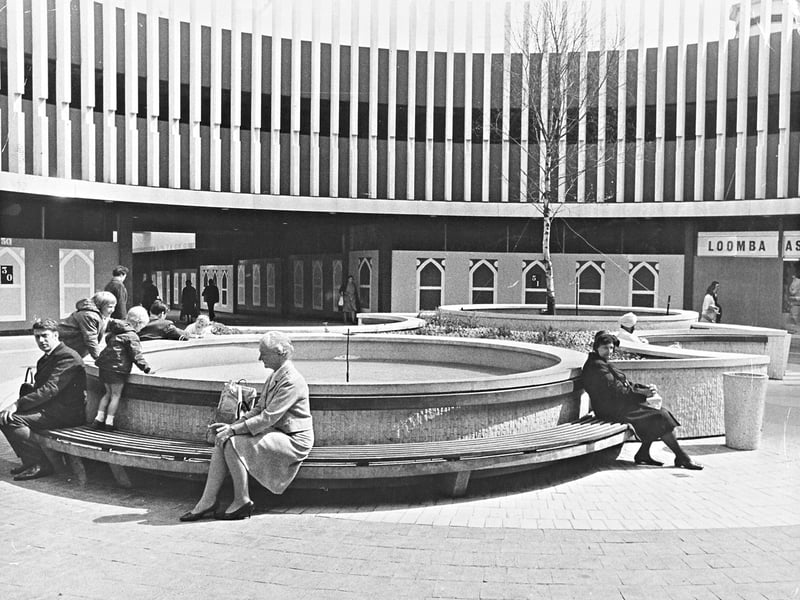 Shoppers rest along the circular seating surrounding the large water feature at the Wulfrun Centre in August 1969. While the modern open-air fountain provided a popular spot for weary visitors to sit and take a break, developers Hammerson were facing a mounting financial burden due to persistent vandalism at the site. Repairing damage and clearing debris from the decorative feature was costing the company a small fortune, casting a shadow over one of Wolverhampton town centre's newest retail developments. Do you remember sitting by the original fountain in the Wulfrun Centre during shopping trips to Wolverhampton?