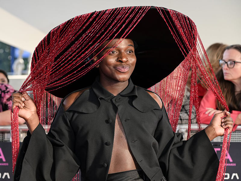 Will Njobvu wearing some typically flamboyant headwear for the awards.