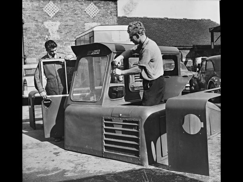 Workmen carefully assemble a heavy-duty tractor cab unit at Cab Craft Ltd in Brownhills during August 1965. Formed just eight months prior under director Mr D. T. A. Thomas, the pioneering firm specialized in designing and manufacturing protective cabs for tractors, earthmovers, and industrial machinery. Exporting 40 per cent of its output overseas, Cab Craft became the very first West Midlands business to sign up to the 'Enterprise Atlantic' trade scheme, aimed at introducing local engineering craftsmanship to transatlantic markets. Were you involved in the local engineering trade in Brownhills, or do you remember the rise of small manufacturing firms across the borough?