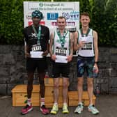 The first three men home in the Craughwell 10 mile, from left: Abaas Edris (2nd), William Fitzgerald (1st) and Jordan Walsh (3rd).