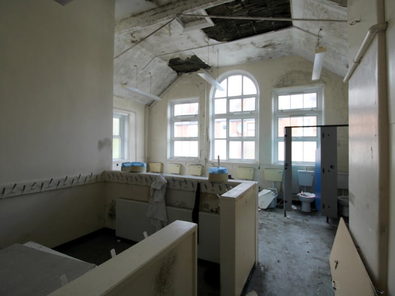 Eerie photos show the remains of Sheffield's former Tinsley Infant School, in Siemens Road, 12 years after it shut for good. The dilapidated site has come to market for £325,000.