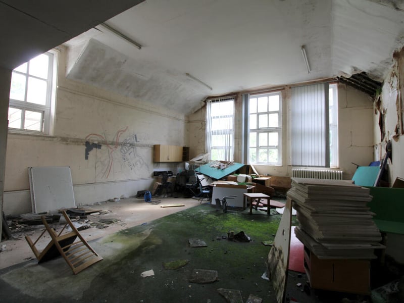 Eerie photos show the remains of Sheffield's former Tinsley Infant School, in Siemens Road, 12 years after it shut for good. The dilapidated site has come to market for £325,000.