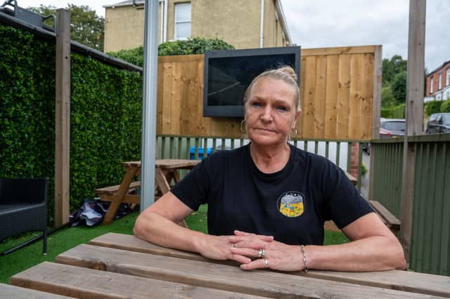 Licensee Wendy McLaren at the Byron House at Nether Edge, part way through the removal of outdoor shelters with televisions.