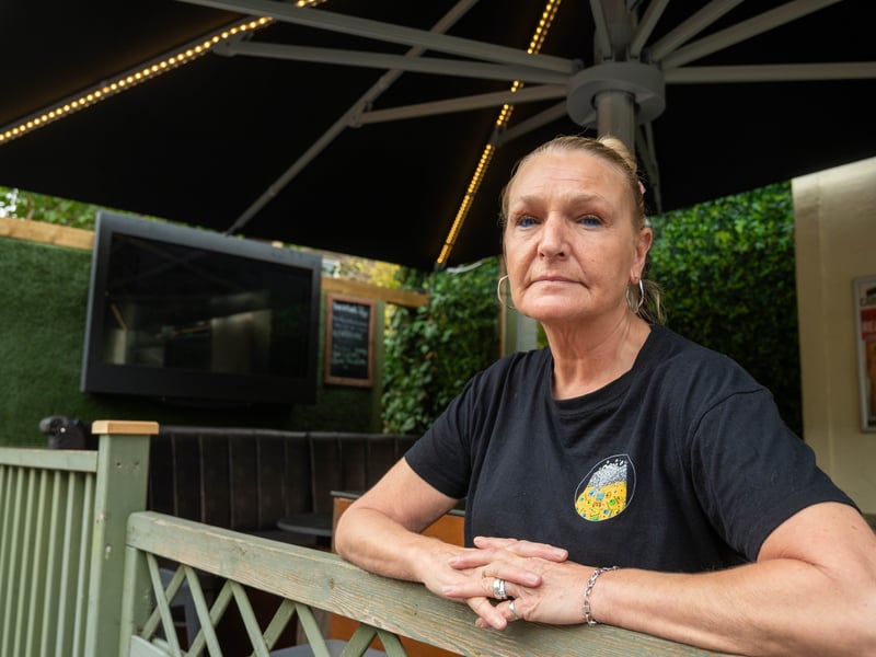 Licensee Wendy McLaren at the Byron House, part way through the removal of outdoor shelters with televisions.
