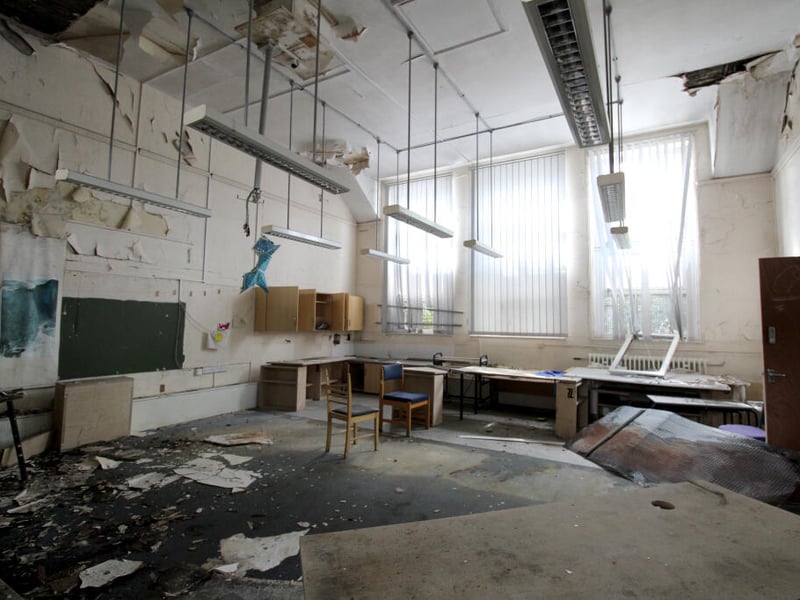 Eerie photos show the remains of Sheffield's former Tinsley Infant School, in Siemens Road, 12 years after it shut for good. The dilapidated site has come to market for £325,000.