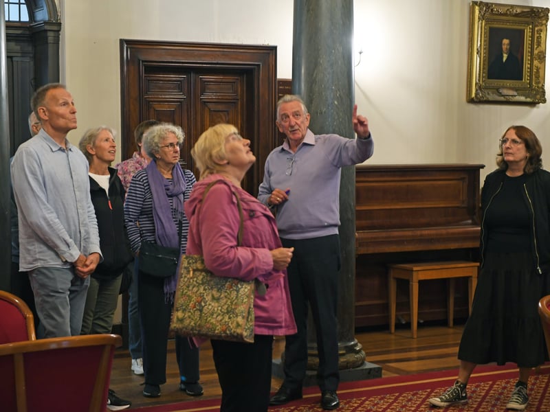 Visitors on tour inside the manor