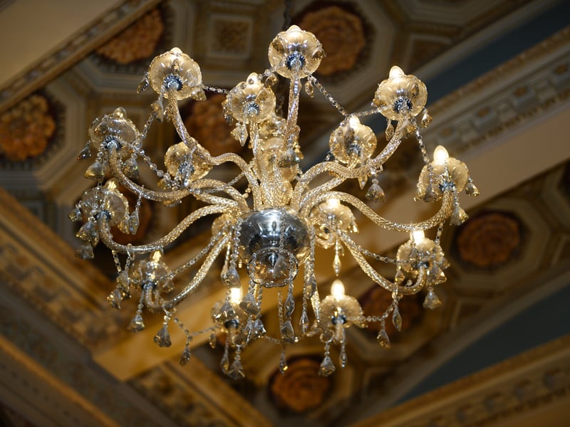 A close up of the chandelier