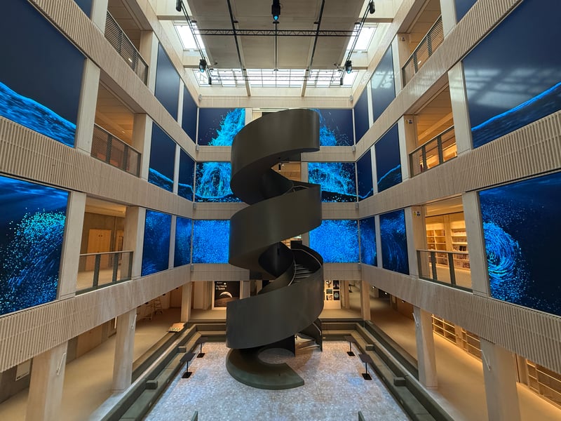 The central atrium is described as a 'living room for the city' and is designed so that anyone can just call in, sit and enjoy the space.