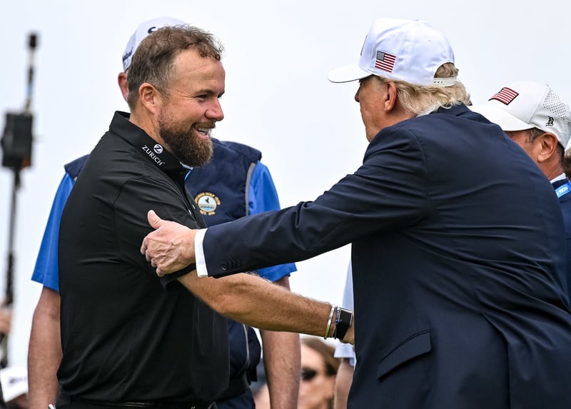 Shane Lowry, left, shakes hands with U.S. President Donald Trump during day four of the Amgen Irish Open Golf Championship 2026 at Trump International Golf Links in Doonbeg, Clare.