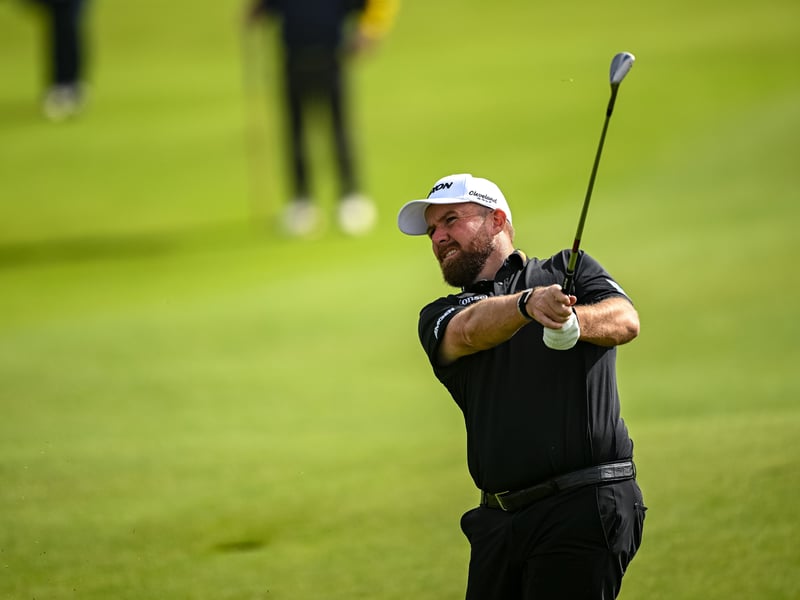 Shane Lowry watches his shot from the sixth fairway.