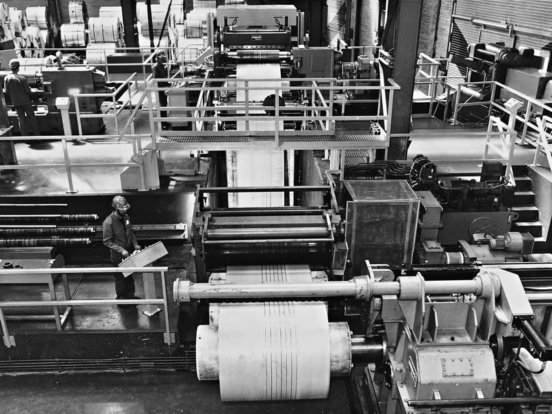 A plant operator monitors high-speed precision slitting machinery in May 1990 at the Steelstock site in Warley. Built on land that was once derelict railway sidings and wasteland, the facility featured what was then Europe's most advanced steel processing equipment. The majority of the machinery was British-made and computer-controlled, custom-designed specifically for the Warley plant following extensive worldwide research to keep the Black Country at the forefront of heavy manufacturing. Did you or someone in your family work in heavy steel processing or manufacturing during the 1990s?