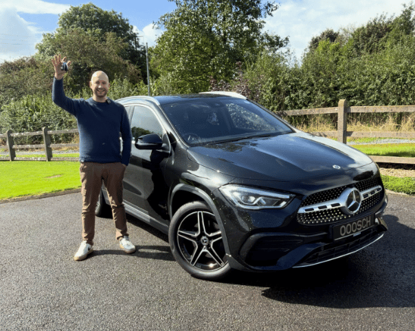 Glen Fitzpatrick after buying his new Mercedes-Benz for only 99c