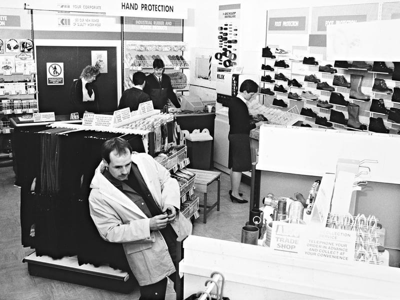 Customers browse aisles stocked with protective footwear, workwear, and safety gear inside the newly opened ARCO Trade Shop in West Bromwich in January 1990. Located just off junction 1 of the M5, the leading UK supplier of industrial and safety products unveiled its fresh retail approach to trade supply. Moving away from traditional, dingy wholesale counters, the bright, modern layout took inspiration from High Street multiples to offer local workers and contractors a clean, easy-to-navigate shopping experience. Do you remember popping into the ARCO Trade Shop to gear up for work back in the 1990s?
