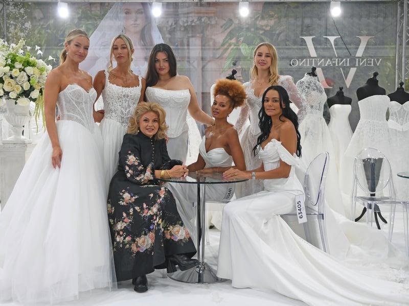 Veni Infantino surrounded by her models.
Picture Gerard Binks