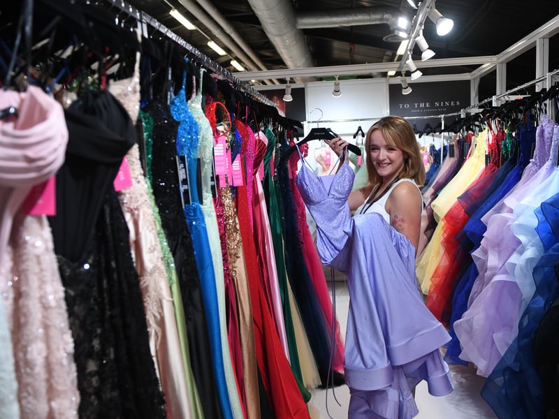Choosing dresses at the show.
Picture Gerard Binks