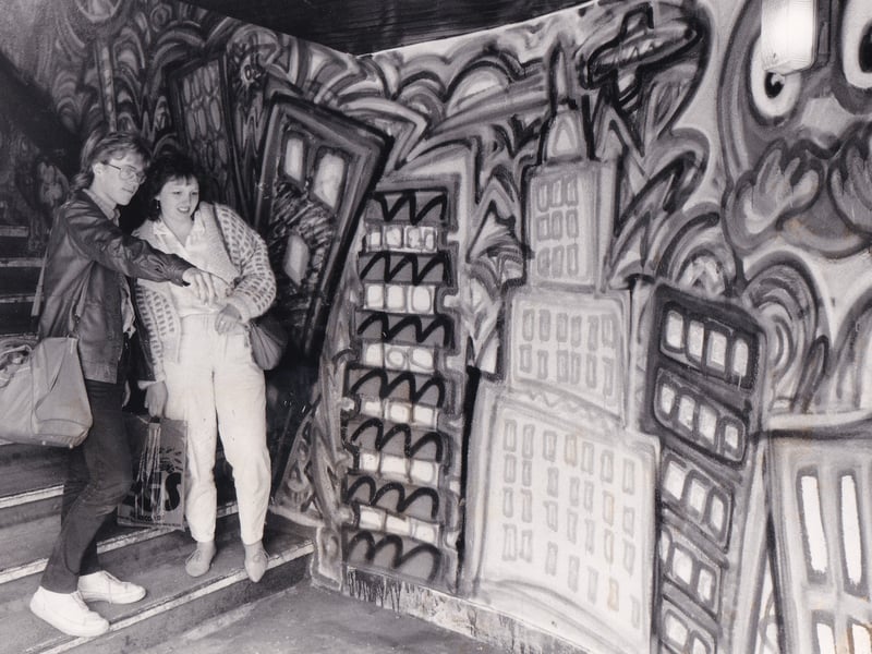 Carl Waite and Andrea Bailey admire the mural at Leeds City Station in June 1986.