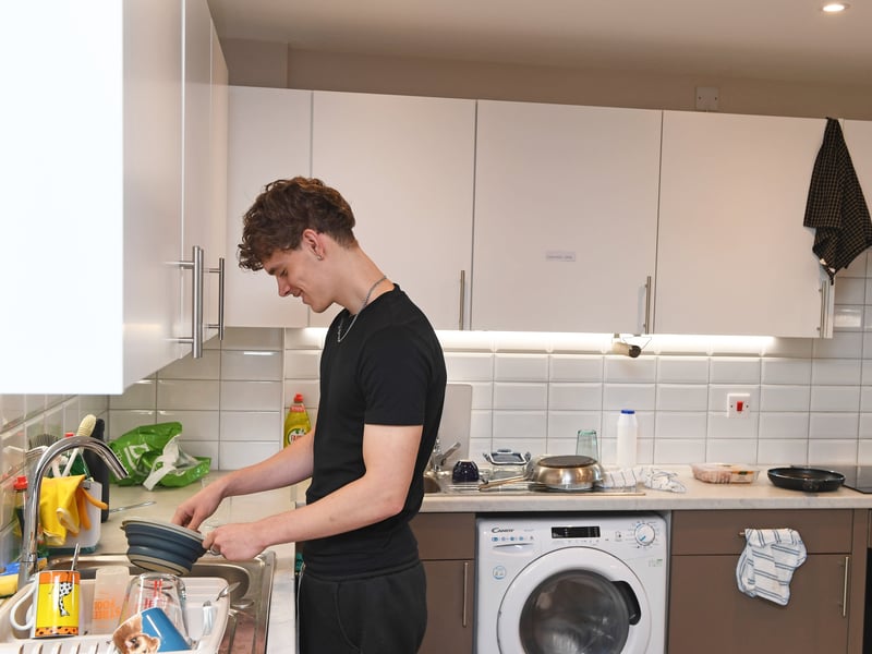 Pictured Izak in the kitchens at Carlton Hill Residences, University of Leeds.