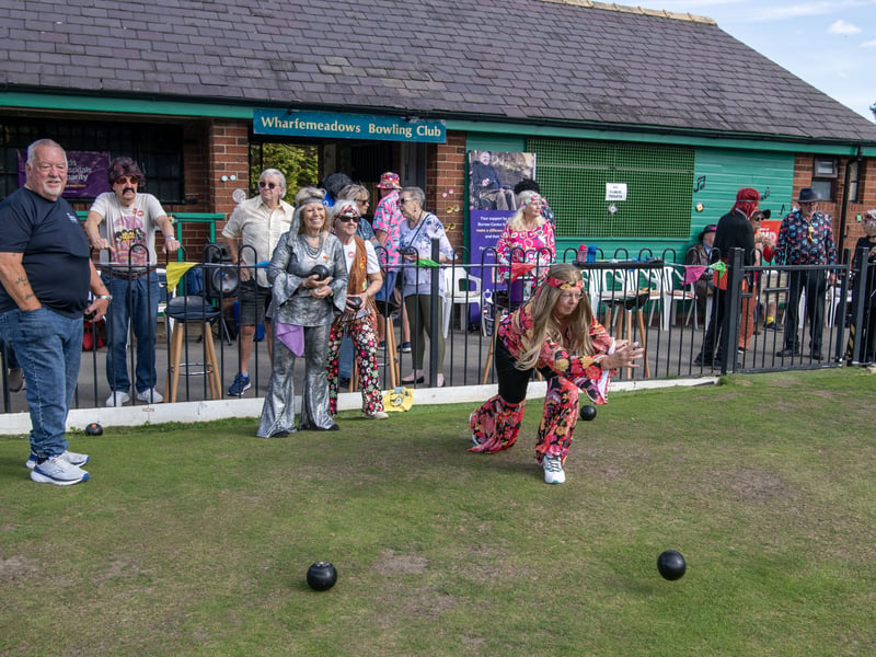 Members in period costumes for the Wharfemeadows Bowling Club charity game to raise money for the Rob Burrow Centre for MND with a 1970's theme.Photograph by Tony Johnson. 24th September 2026