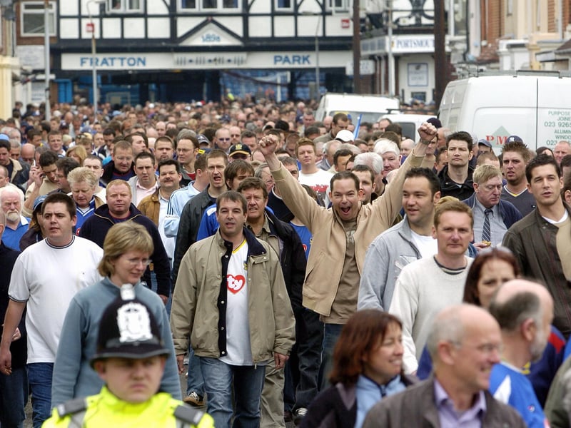 The jovial Pompey fans make their way out of Fratton Park after witnessing the 4-1 Premiership win over Southampton in April 2005.