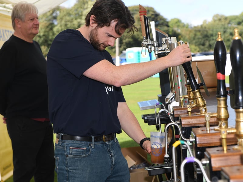 Pulling pints at the festival.