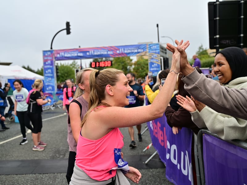 Here are 17 more finish line photos of friends and families celebrating at the Sheffield Run For All 10K on September 27, 2026.