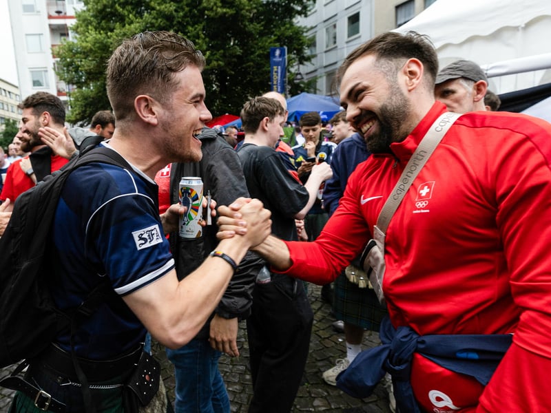 Scotland and Switzerland fans meet in Koln for the game.