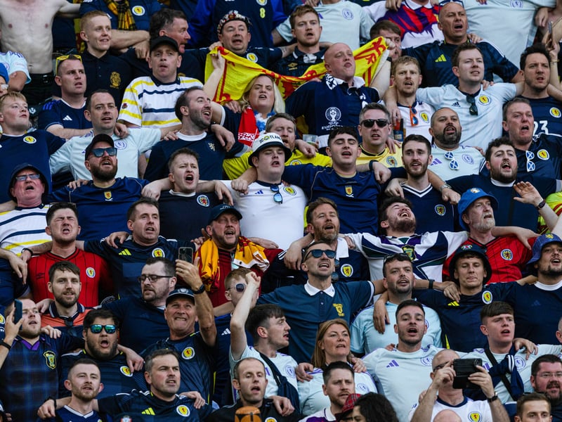 Scotland fans sing the national anthem ahead of kick-off.