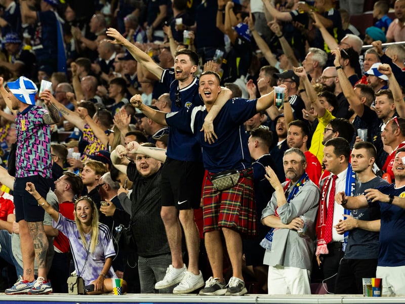 Two Scotland fans soak in that pre-game atmosphere in Koln.