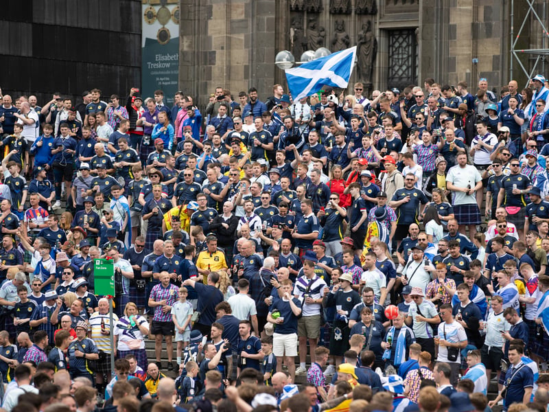 Scotland fans surround the Cathedral on Koln city centre.