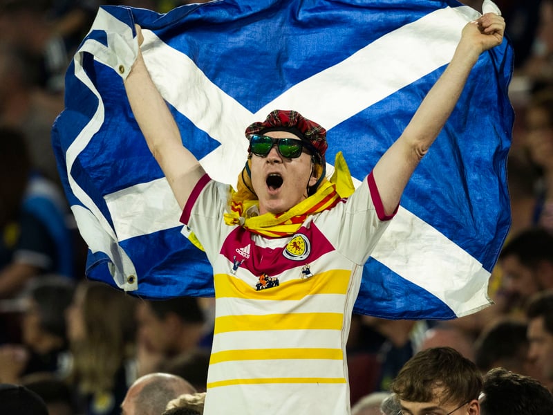 A Scotland waves the Saltire in Koln.