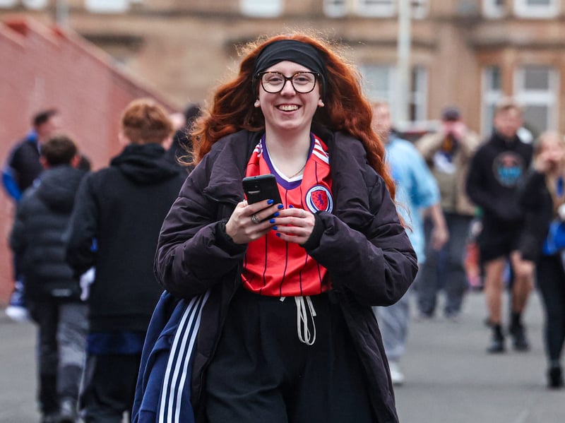 A Scotland fan poses for a photo ahead of the game vs Switzerland.
