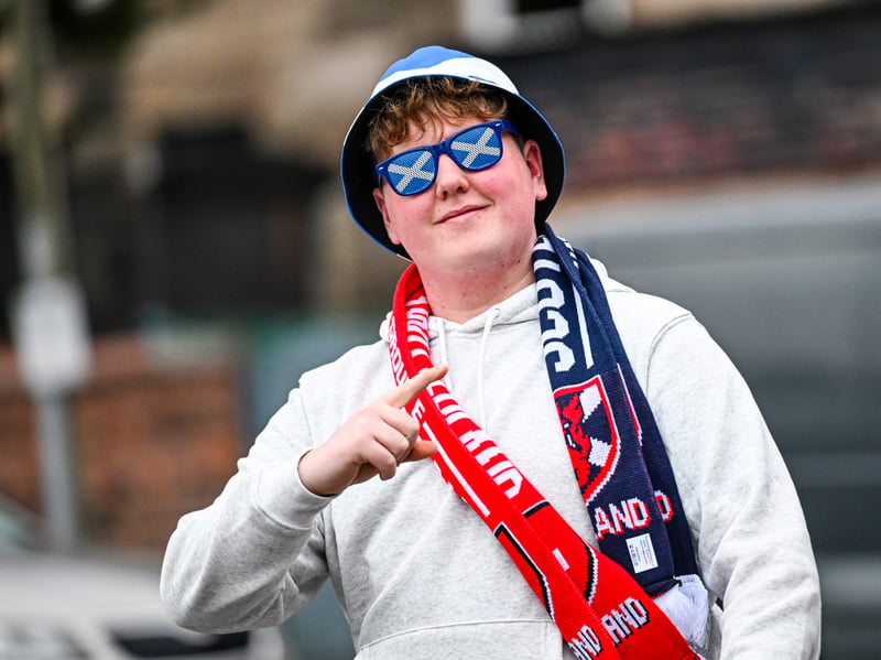 A young Scotland fan with saltire sunglasses ahead of kick-off.
