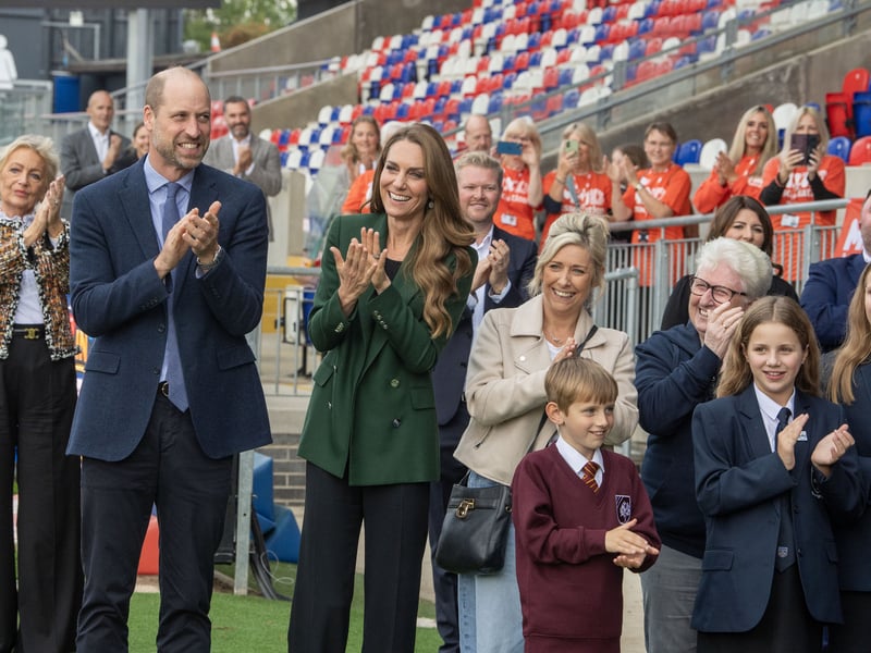 Prince and Princess of Wales along with Rob Burrow's family greet Sir Kevin Sinfield at Wakefield Trinity Rugby League Club finishing day 3 of his ultramarathons